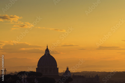 St Peter's basilica dome at sunrise in Rome, Italy