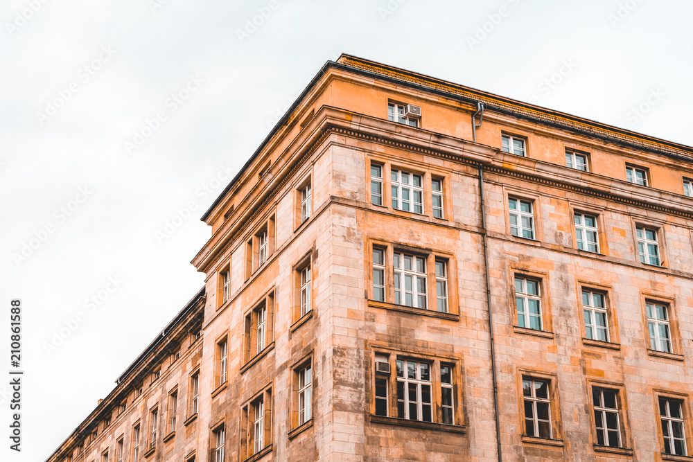 historical building in orange colors at berlin, mitte