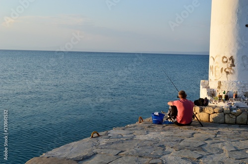 fisherman on the seashore 