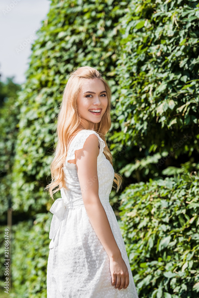 beautiful happy young blonde woman smiling at camera outdoors beautiful happy young blonde woman smiling at camera outdoors