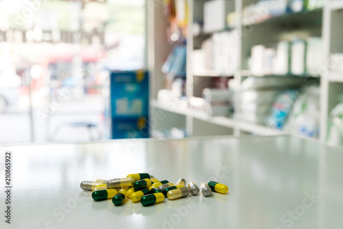 Drug prescription for treatment medication. Pharmaceutical medicament, cure in container for health with counter store table pharmacy background