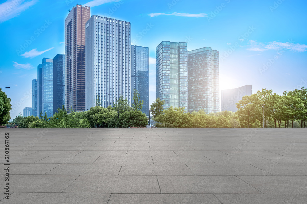 Urban skyscrapers with empty square floor tiles