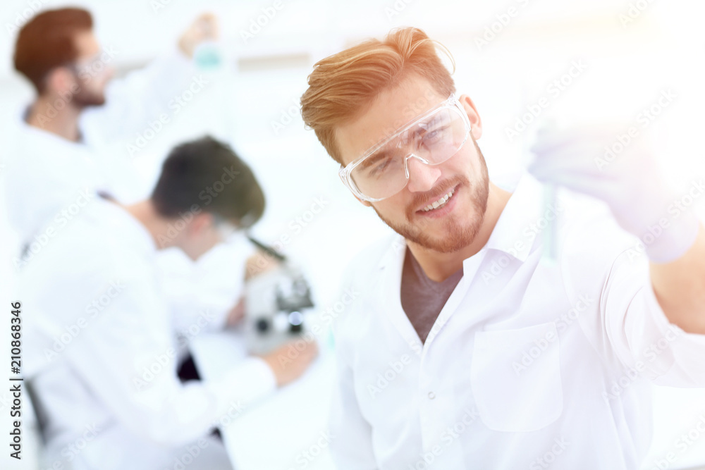 closeup. scientist with beaker closeup. scientist with beaker