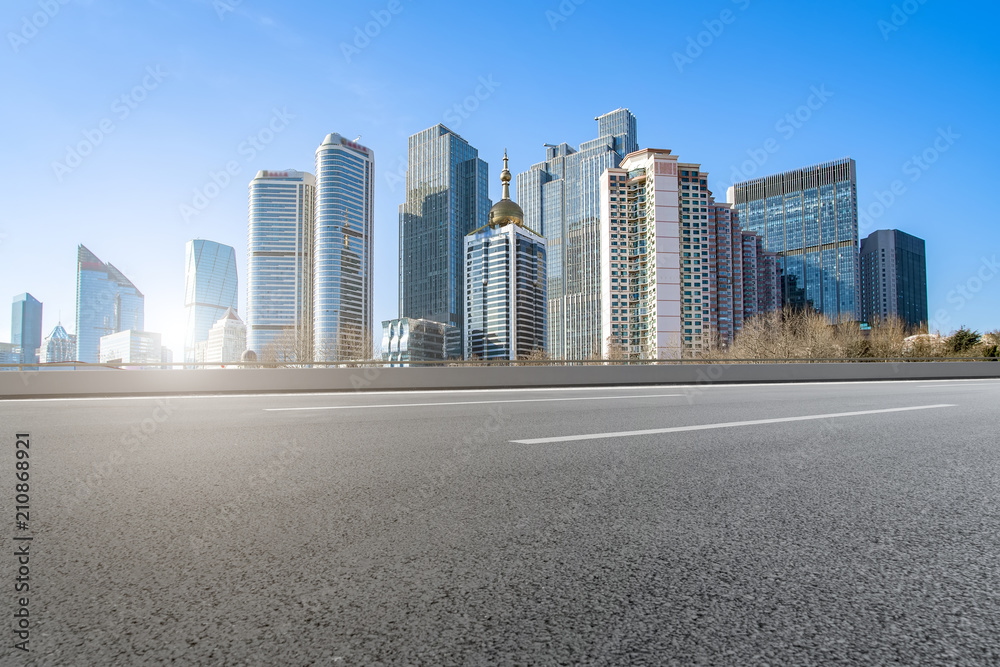 Air highway asphalt road and office building of commercial building in modern city Air highway asphalt road and office building of commercial building in modern city