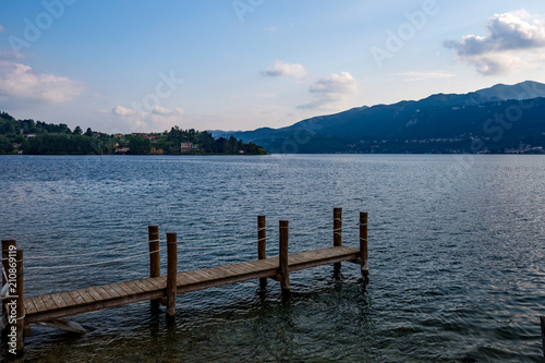Scenery wooden quay in Italy with cotton ropes