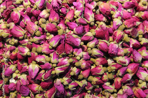 Herbal natural floral tea infusion with dry white rose flowers ingredients