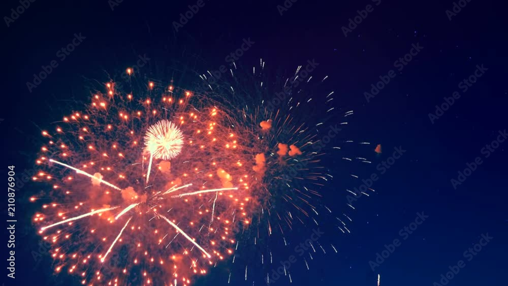 Bright fireworks display in the sky. Bright fireworks display in the sky.