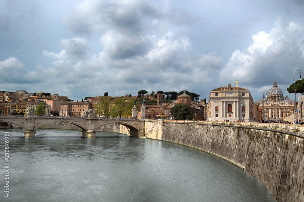 Tiber river with ancient city architecture of Rome and beautiful old stone bridge, Rome, Italy. Tiber river with ancient city architecture of Rome and beautiful old stone bridge, Rome, Italy.