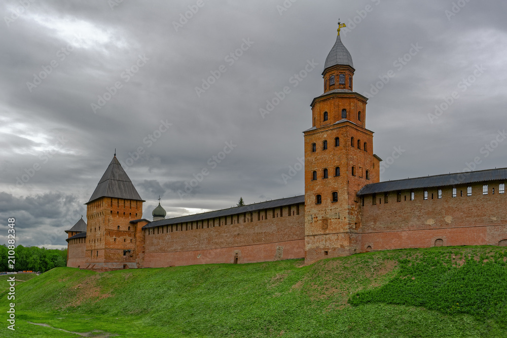 Red brick towers and walls of the Kremlin fortress in Veliky Novgorod, Russia.