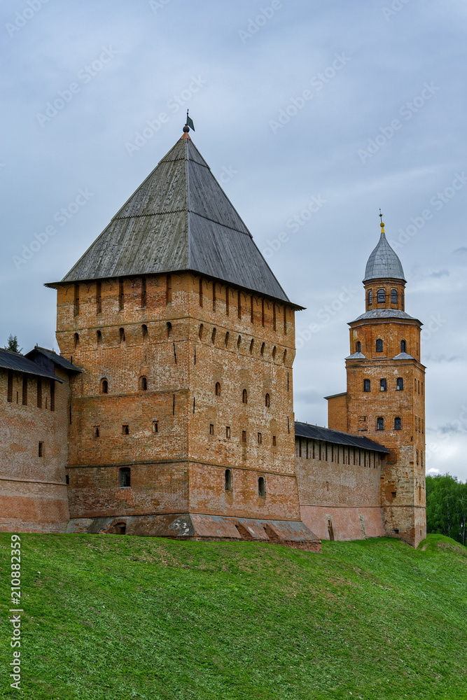Red brick towers and walls of the Kremlin fortress in Veliky Novgorod, Russia.