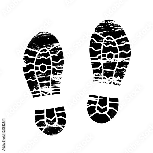 Footprints and shoeprints icon in black and white showing bare feet and the imprint of the soles with patterns of male and female footwear. Shoes boots imprint