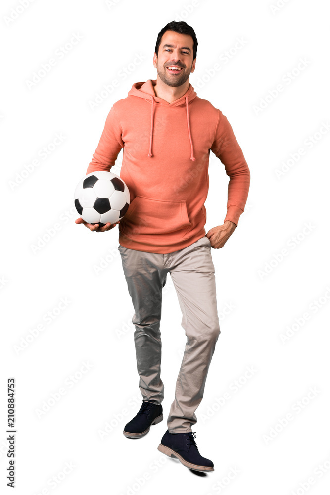 Full body of  Man in a pink sweatshirt with soccer ball