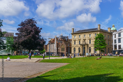 Exeter. June 02, 2018. Beautiful, medieval houses around the square near the Exeter Cathedral. Devon, South West England, United Kingdom.