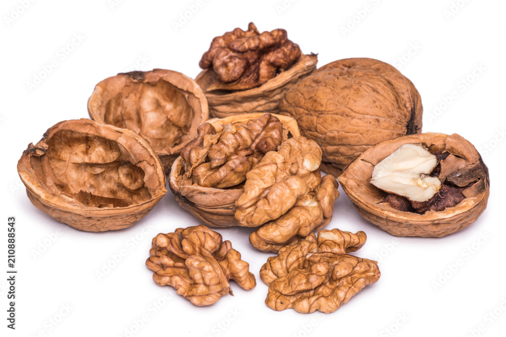 Group of peeled walnut kernels isolated on white background. Group of peeled walnut kernels isolated on white background.