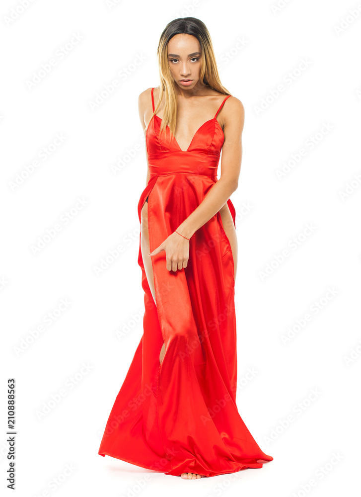 Young african woman in long red dress