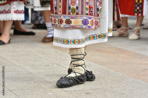 Beautiful traditional Romania costumes and footwear from Dobrogea , Romania