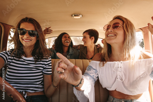 Women enjoying themselves on a road trip