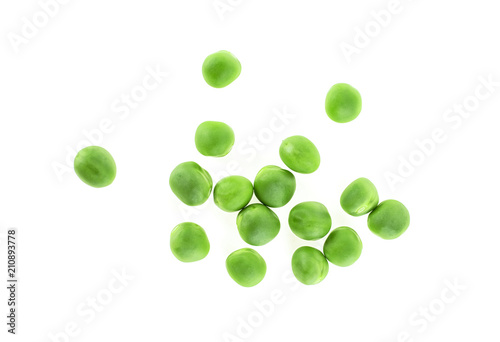 Young green peas on a white background, top view.