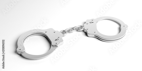 Metal handcuffs isolated on white background, 3d illustration photo