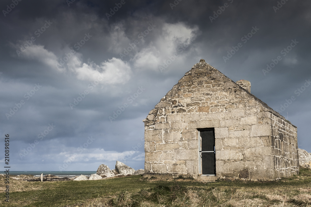 Lonely watch house coastline in France on a stormy day, Guisseny, Brittany Lonely watch house coastline in France on a stormy day, Guisseny, Brittany
