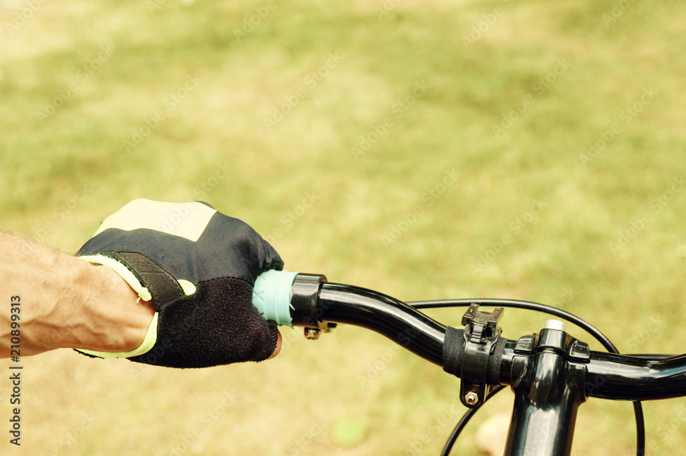 Cycler driving bicycle on country road Cycler driving bicycle on country road