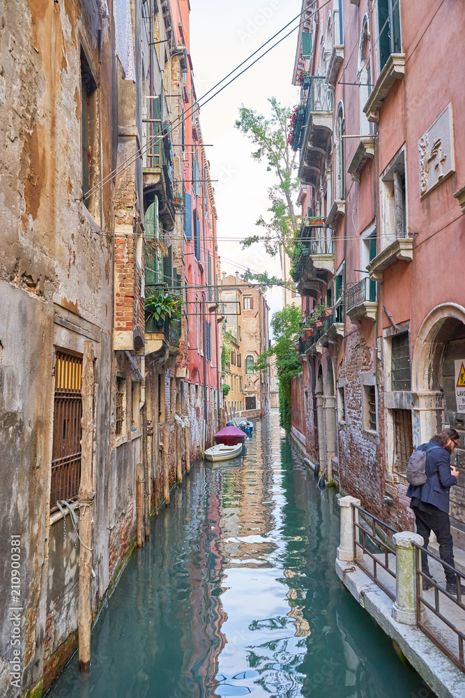 Typical small canal in Venice in Italy