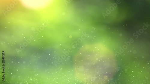 Slow motion of the abstract air bubbles on sunny yellow green sunny nature bokeh background. photo