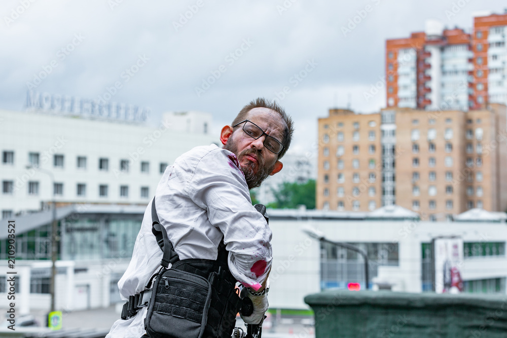 Powerful man Holding Gun. War Action Movie Style Powerful man Holding Gun. War Action Movie Style