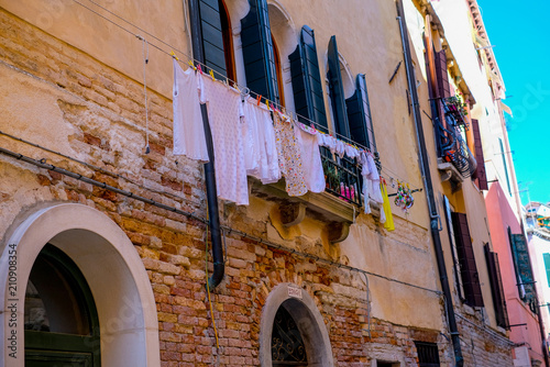 laundry hanging on the window, old architecture in Italy, Venice