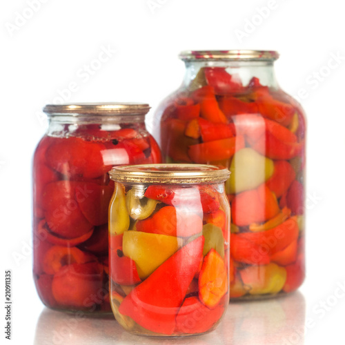 collection set of canned vegetables in glass jars isolated on white background