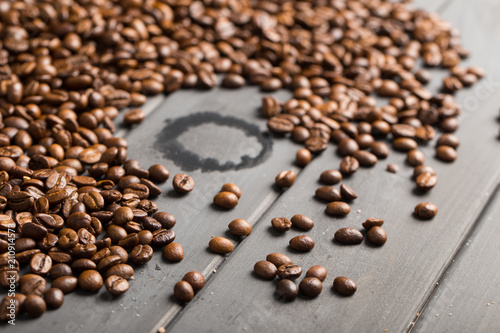 black coffee beans on black background