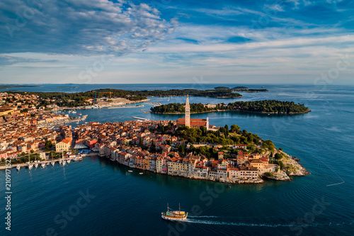 Fototapeta Naklejka Na Ścianę i Meble -  Beautiful Rovinj at sunset - HDR aerial view taken by a professional drone from above the sea. The old town of Rovinj, Istria, Croatia