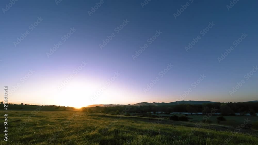 4K UHD mountain meadow timelapse at the summer or autumn time. Wild nature and rural field. Clouds, trees, green grass and sun rays movement. 4K UHD mountain meadow timelapse at the summer or autumn time. Wild nature and rural field. Clouds, trees, green grass and sun rays movement.