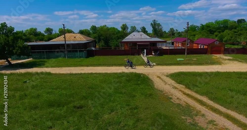 Wallpaper Mural children riding bicycles on a country road Torontodigital.ca