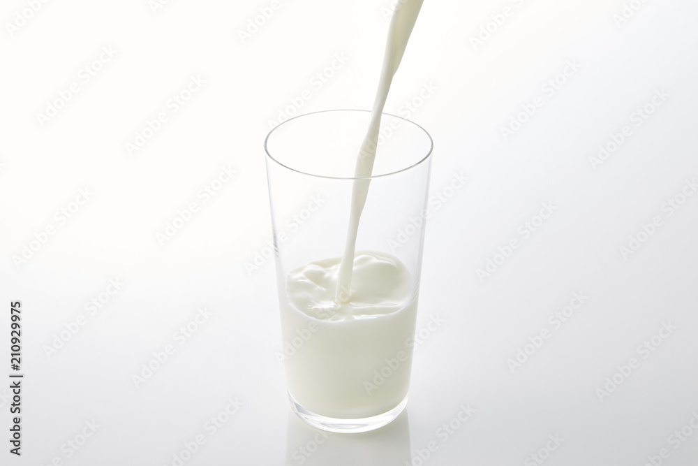 fresh milk in the glass on white background fresh milk in the glass on white background