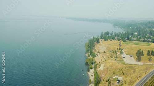 Drone shot of Okanagan lake shore during smokey summer photo