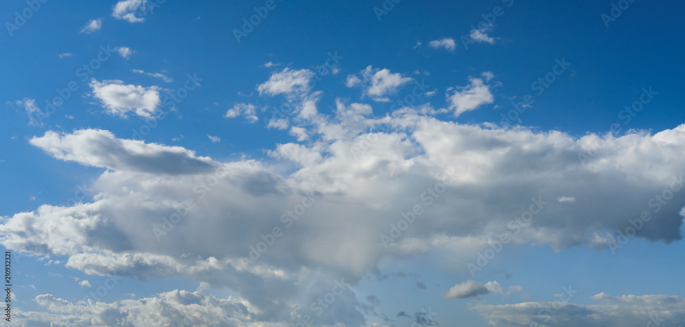 Wide sky panorama with scattered cumulus clouds Wide sky panorama with scattered cumulus clouds