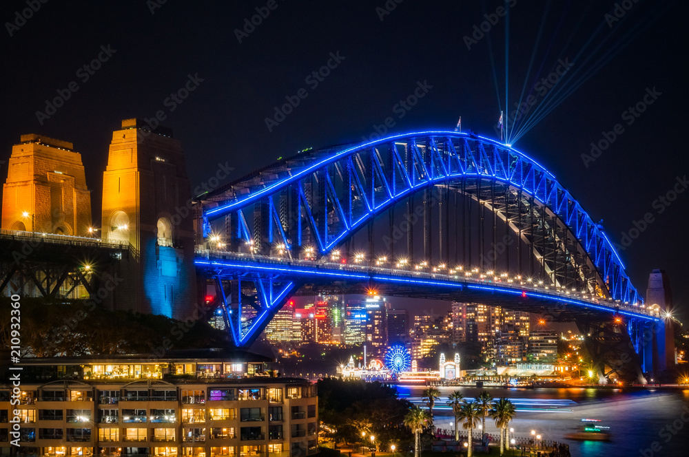 Fototapeta premium Sydney Harbour Bridge dressed in Vivid Blue Color -New South Wales, Australia
