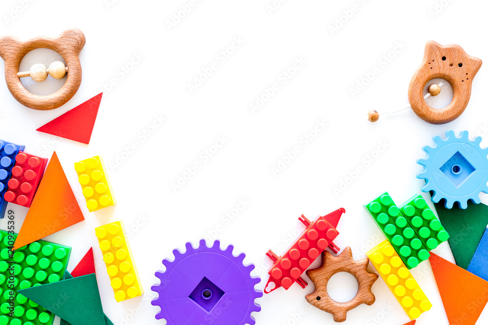 Educational toys for children mockup. Plastic lego blocks and clacks on  white background top view copy space foto de Stock | Adobe Stock