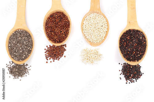 Black red white quinoa and chia seeds in wooden spoon isolated on white background with copy space for your text