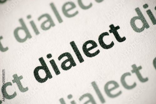 word dialect  printed on paper macro