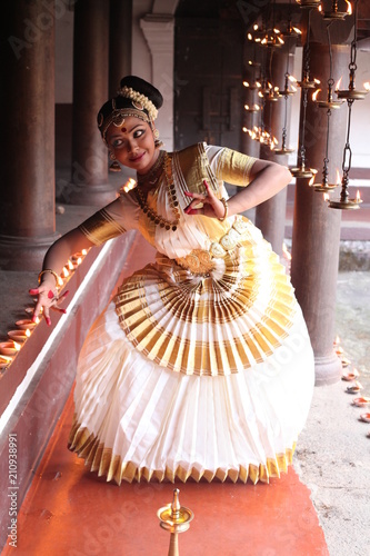 mohiniyattam is one of the eighth classical dance forms of india.it is from the state of kerala and distinct for its graceful body movements photo