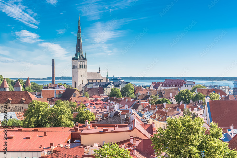 Tallinn in Estonia, panorama of the medieval city with Saint-Nicolas church, colorful houses and typical towers
