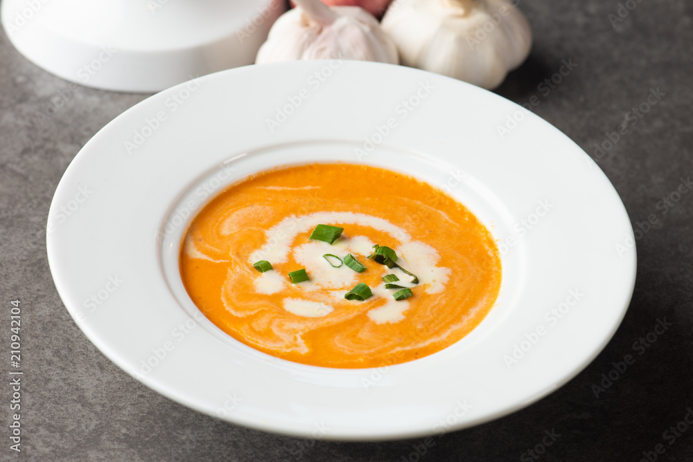 pumpkin soup with spices on table pumpkin soup with spices on table