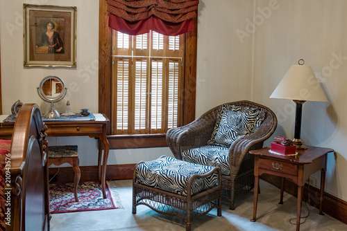 Bedroom Sitting Area with Wicker Chair