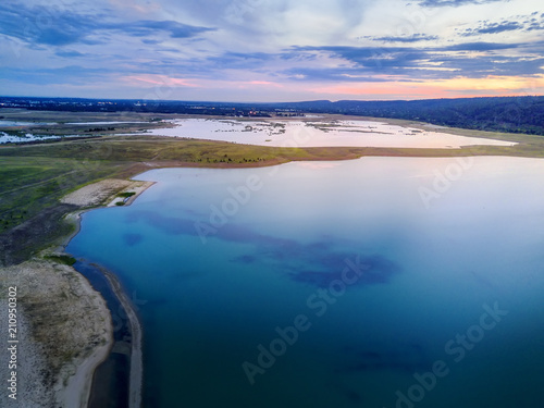 Sunset views over the rural landscape and lake