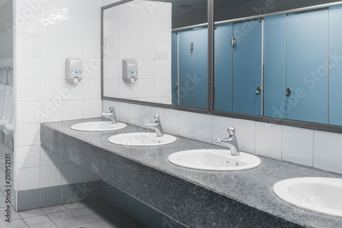 Public toilet and Bathroom interior with wash basin and toilet room.
