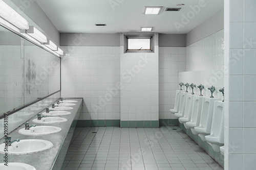 Public toilet and Bathroom interior with wash basin and toilet room.