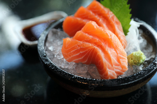 Salmon sashimi on ice Japanese food photo