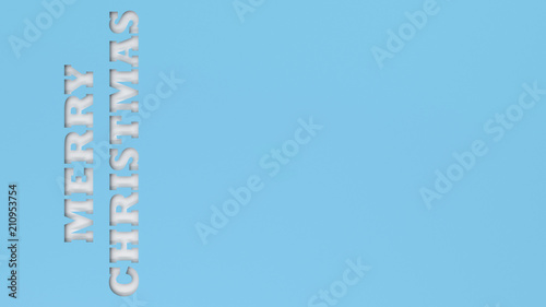 White Merry Christmas words cut in blue paper
